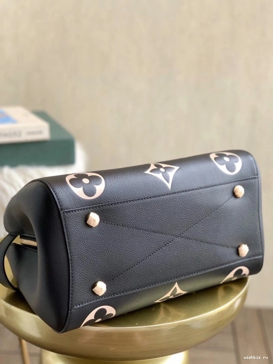 WIS MM MONTAIGNE LOUIS VUITTON 0812